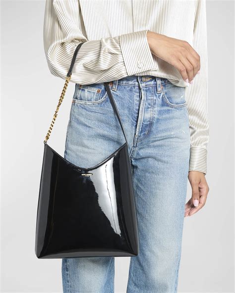 Saint Laurent Sac Patent Leather Hobo Bag .